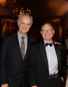 Windrush Farm Board Chairman Bob Gore stands with the Dances with Horses Gala auctioneer, Jim Braude of NECN. The event raised $120,000 to benefit the clients with disabilities at the farm. 